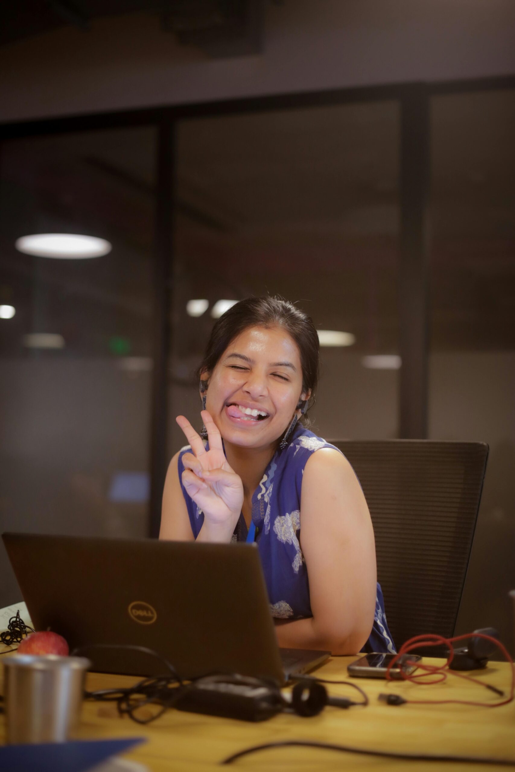 Indian woman with cute expression working at office
